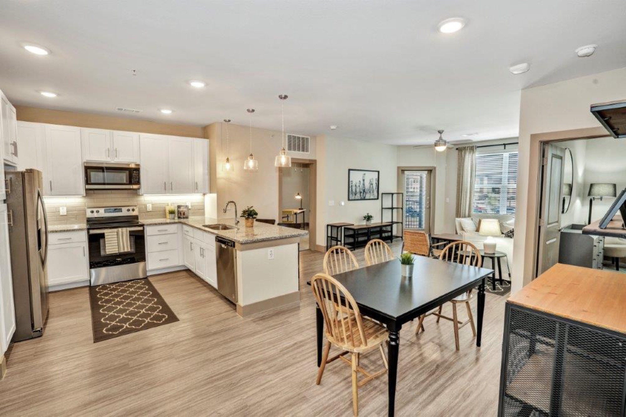 Kitchen and living room interior at The Duvall